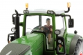 AT-Collections 32141 - Teenager Jaff fährt Traktor auf Siku Trecker nah